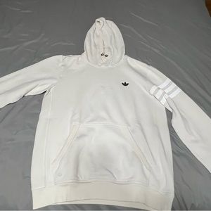 White adidas hoodie with reflective 3 stripes on the arm
